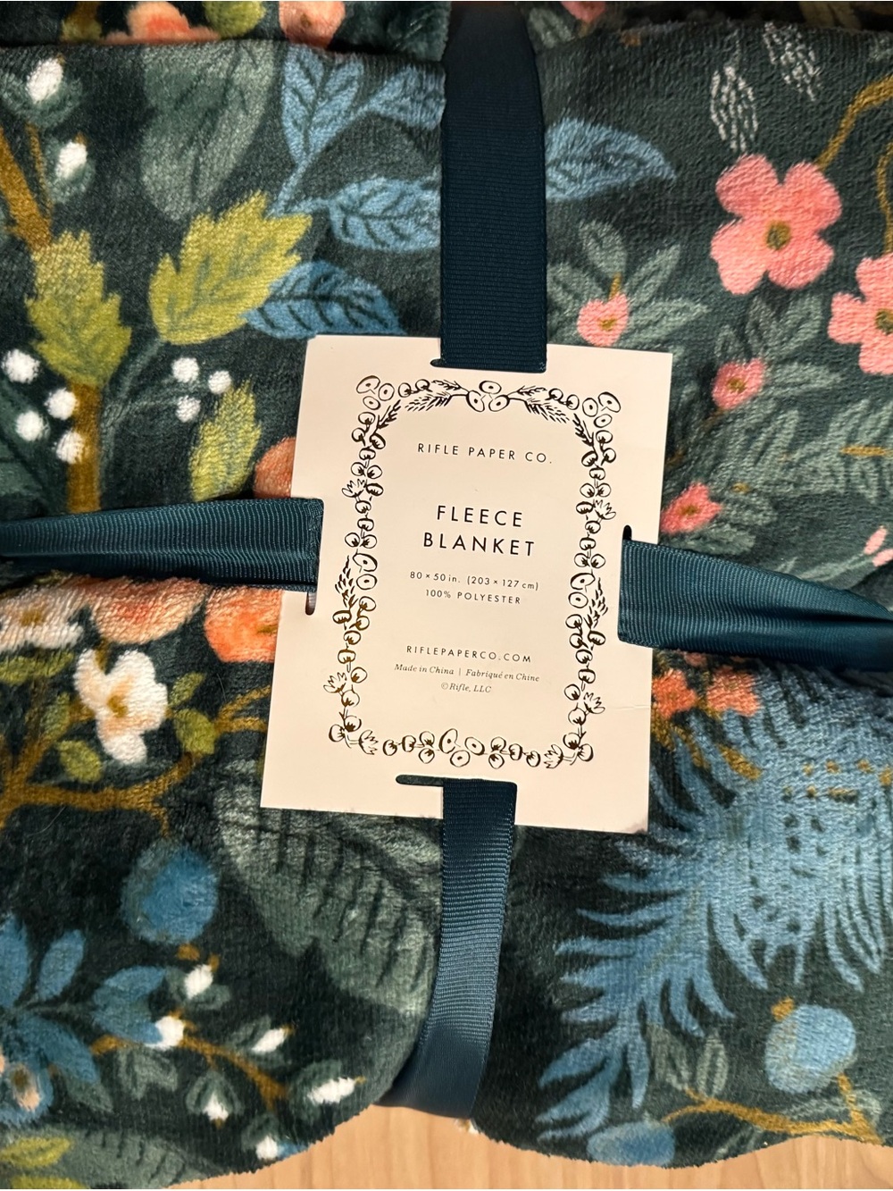 Rifle Paper Co. Dark Green Floral Fleece Blanket with Pink & Blue Accents